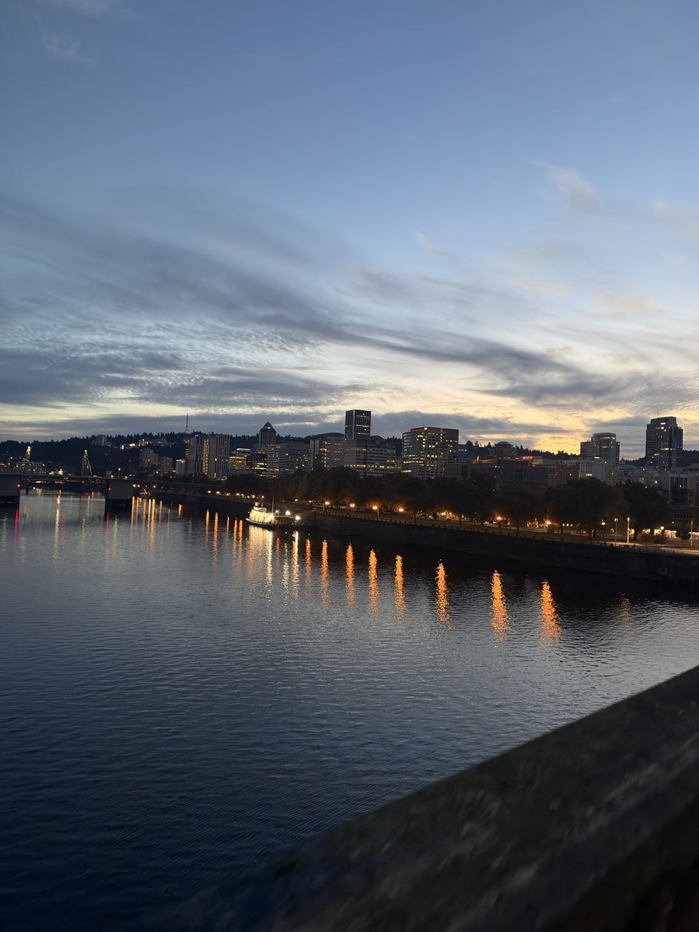 Evening sky and warm reflections along the Portland waterfront